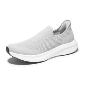 A gray slip-on sneaker with a knit upper and a white, thick cushioned sole, designed for comfort and casual wear.