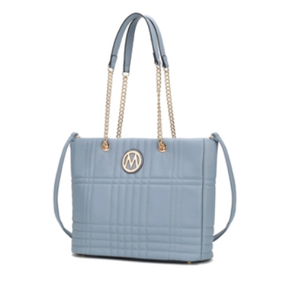 A light blue, rectangular handbag with gold chain handles and a circular logo on the front.