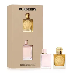 Burberry Goddess Parfum and Burberry Her Eau de Parfum gift set, featuring one golden and one pink bottle, displayed in a beige box with the Burberry logo.