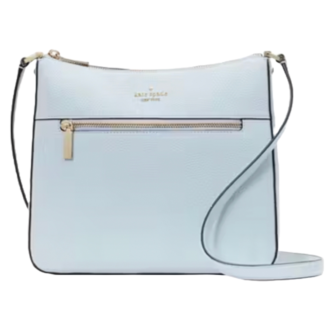 Light blue Kate Spade crossbody bag with a front zipper pocket, gold-tone hardware, and adjustable strap.