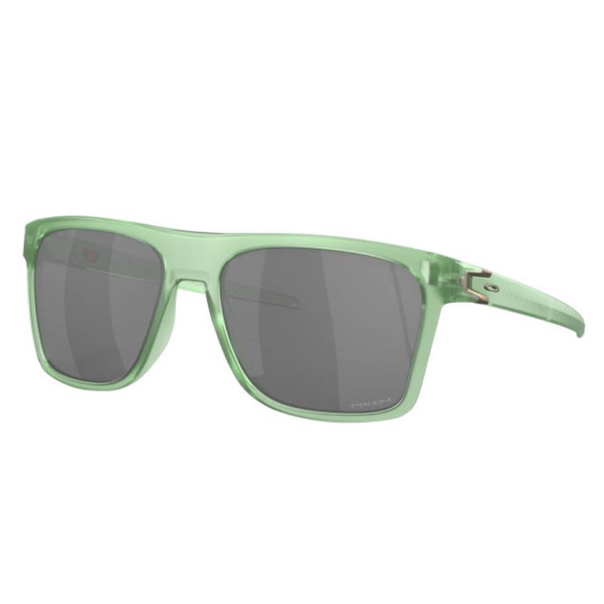 Oakley Leffingwell Sunglasses feature a translucent green frame with dark rectangular lenses. The design includes a subtle logo on the temple and textured arms for a stylish, secure fit.