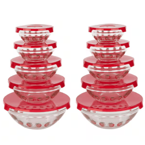 A set of clear glass bowls with red lids, each decorated with a pattern of strawberries.