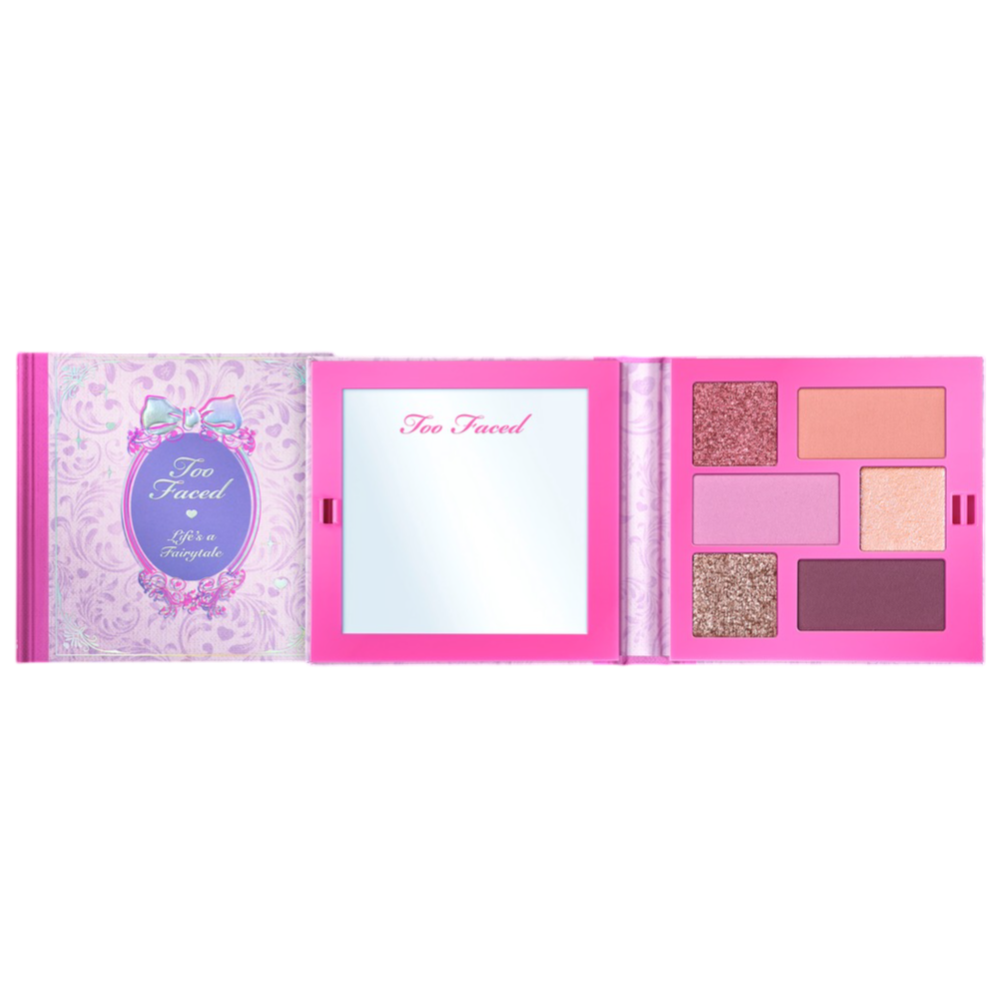 Too Faced eyeshadow palette titled \“Life's a Fairytale\“ with five shades in a pink case, featuring a mirror on the right side.