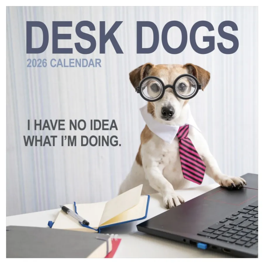 2026 calendar cover titled \“Desk Dogs\“ features a dog wearing glasses and a tie at a desk with the text \“I have no idea what I'm doing.\“