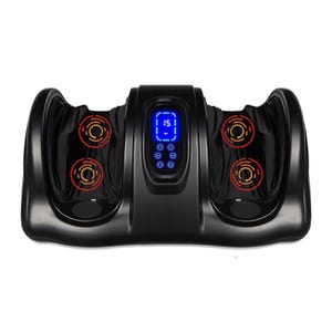 A Shiatsu Foot Massager with a sleek black design features two foot compartments, LED display, and control buttons. Red circular indicators suggest heating or vibrating elements for therapeutic foot massage.