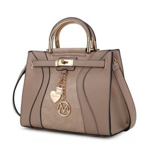 A beige handbag with gold accents features a top handle, a decorative lock, and charm chains.