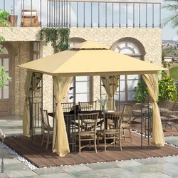 A beige gazebo with decorative patterns, featuring a metal frame and sheer curtains, covers an outdoor dining set with a table and chairs on a wooden deck surrounded by pebbles.