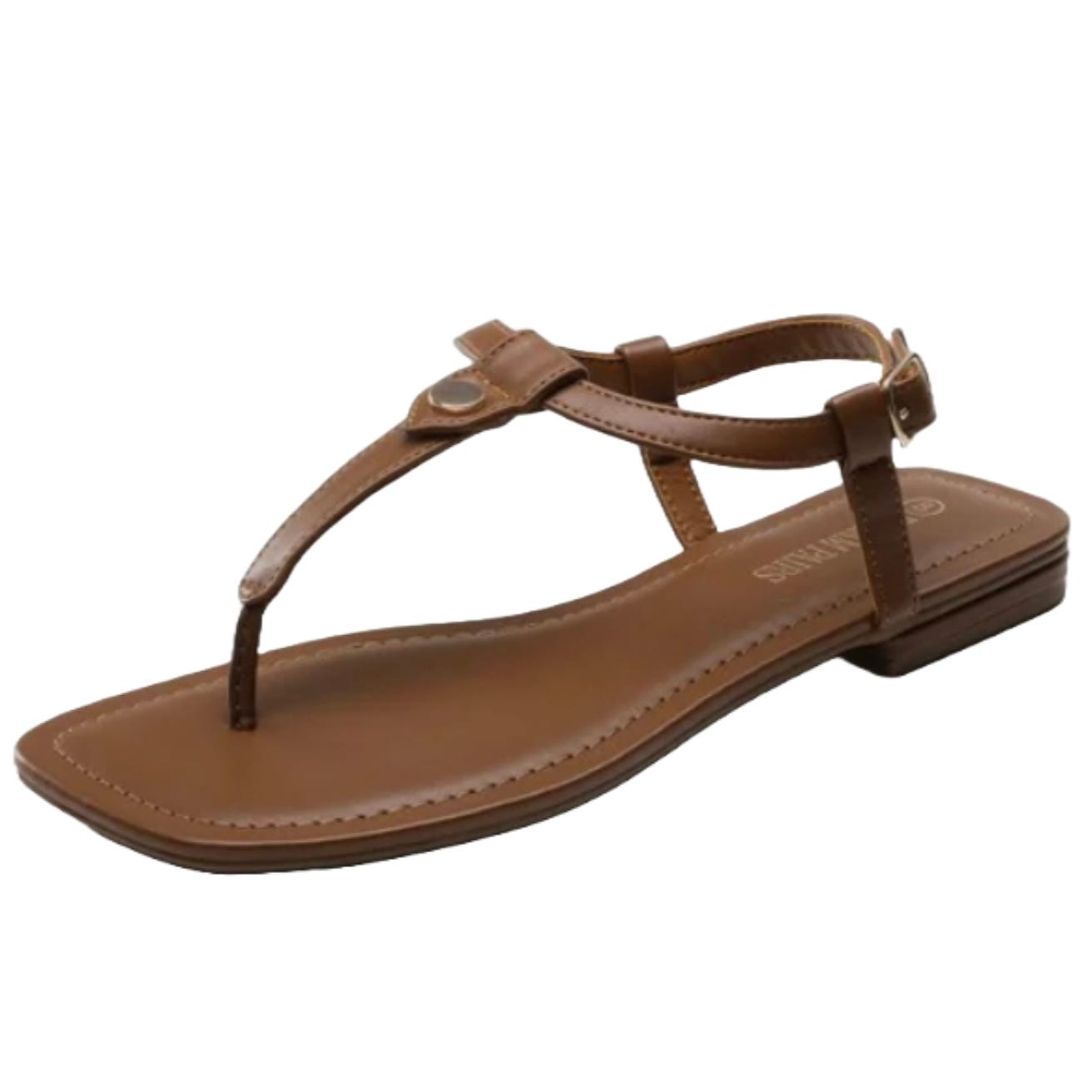 A brown flat sandal with a thong strap design, featuring a toe post, an ankle strap with a buckle closure, and a low heel.