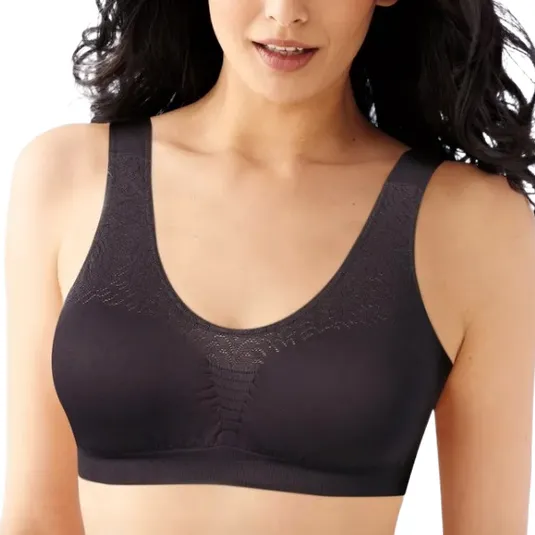 A seamless black bra with a textured design and wide straps, offering full coverage support.