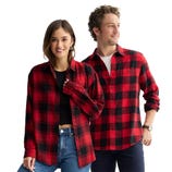 Two people wearing red and black plaid shirts; one person styles it over a black top and jeans, while the other pairs it with a white undershirt and dark pants.