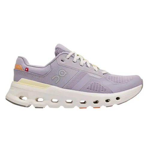 A lilac athletic shoe with a sleek design, featuring a breathable mesh upper, thick cushioned sole, and distinctive cut-out holes for enhanced airflow.