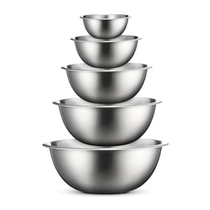 A set of five nested stainless steel mixing bowls of different sizes.