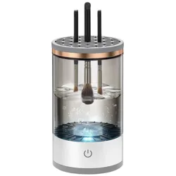 An electric makeup brush cleaner featuring a transparent container with brushes immersed in water, designed for easy and efficient cleaning.