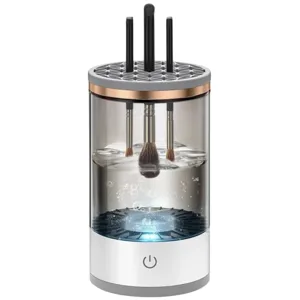 An electric makeup brush cleaner featuring a transparent container with brushes immersed in water, designed for easy and efficient cleaning.