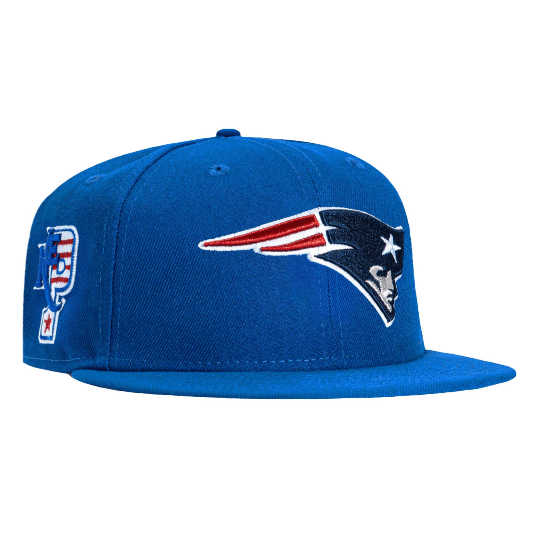 Blue cap featuring the New England Patriots logo on the front and a patch on the side.