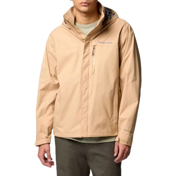 A beige Columbia rain jacket with a hood, featuring a front zipper and chest pocket, worn by a person.