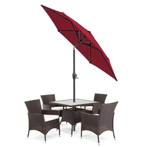 Outdoor furniture set with a square table, four brown wicker chairs with cushions, and a red patio umbrella.