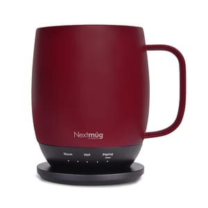 The Nextmug Temperature Controlled Mug is a sleek, red mug with a handle, designed to keep beverages at specific temperatures (Warm, Hot, Piping) as indicated on its base.