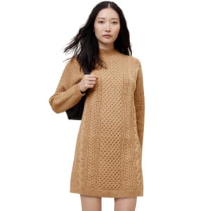 A camel-colored, long-sleeve sweater dress with a textured knit pattern and a high neckline, offering a cozy and stylish look.