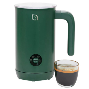 A green electric milk frother with a control panel is shown next to a small glass of espresso.