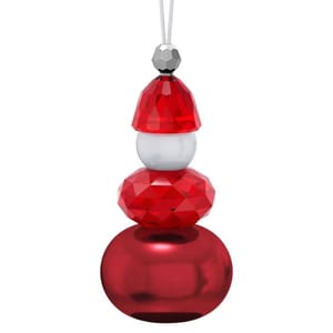 A festive Swarovski Santa ornament featuring faceted red crystals forming a Santa hat and body, a white spherical crystal for the face, and a shiny solid red bulb at the bottom, all suspended on a thin string.