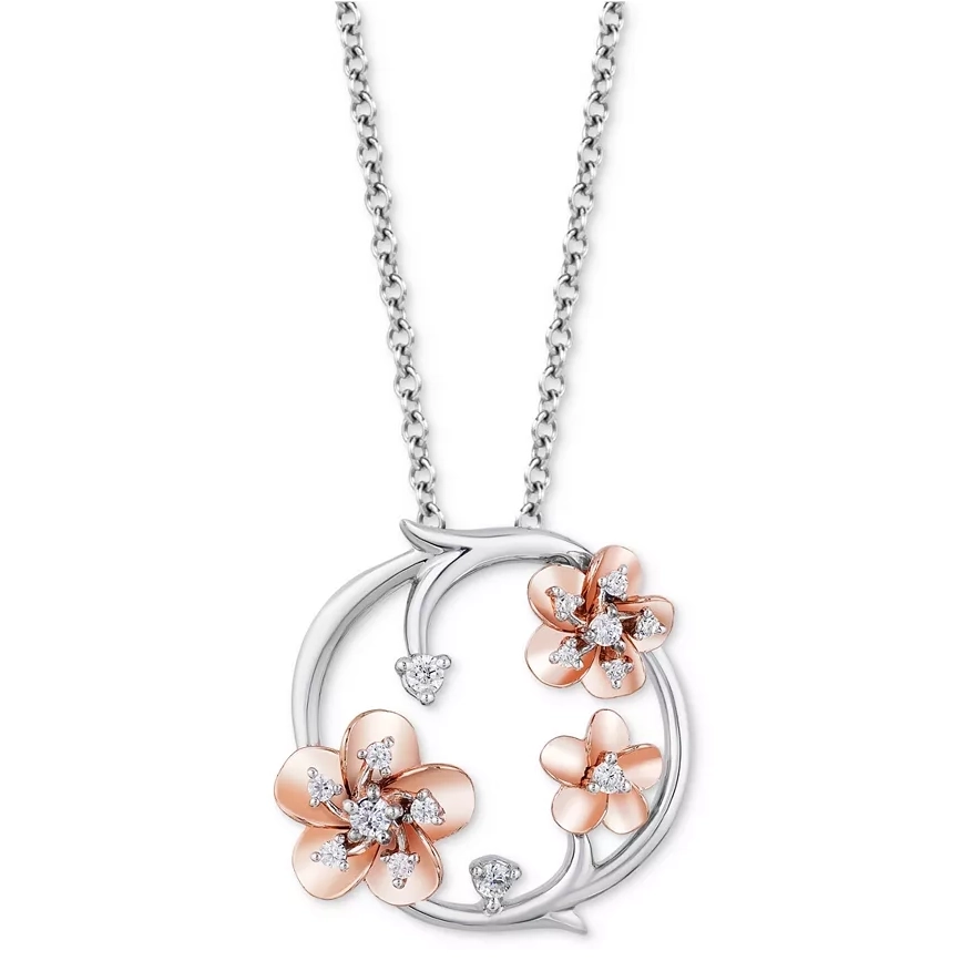 Silver necklace with a circular pendant featuring rose gold flowers and diamond accents.