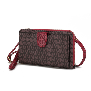 A wallet with a dark brown pattern featuring repeated \“M\“ letters, accented with red textured leather and zipper, includes a matching strap.