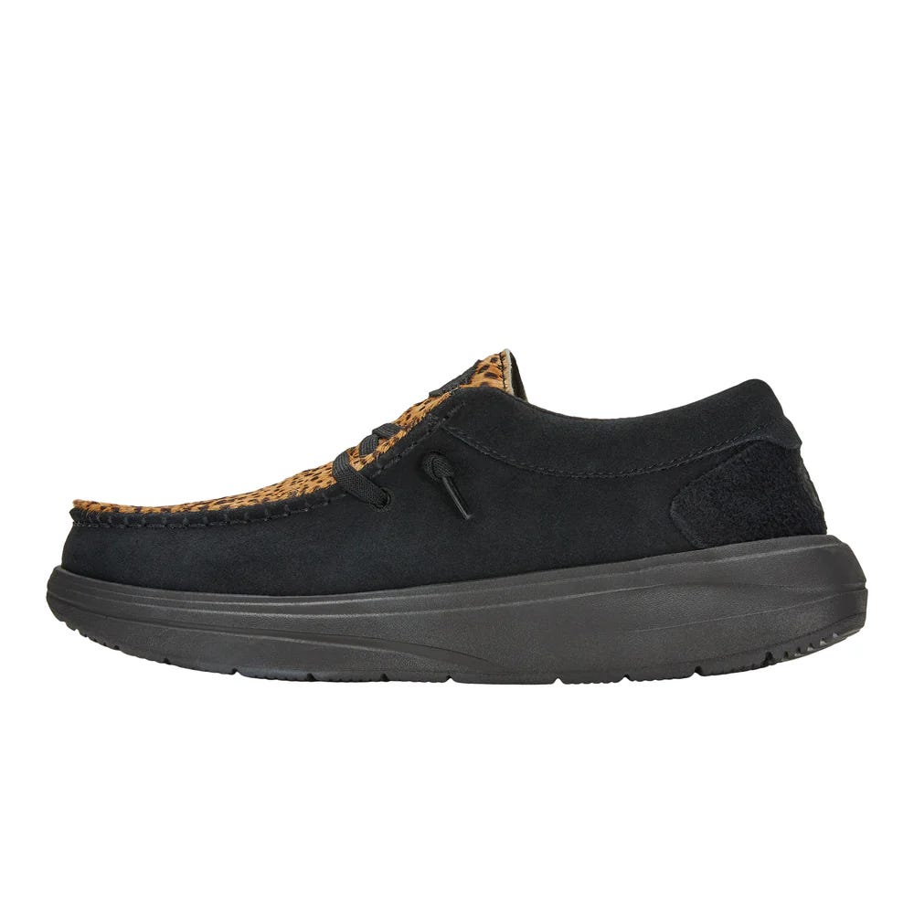 Black suede moccasin-style shoe with a textured brown upper and black sole, featuring decorative laces.