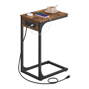 A small side table with a wooden top features a built-in power strip, including outlets and USB ports. The table supports a teacup, smartphone, and computer mouse with a plug-in cable.