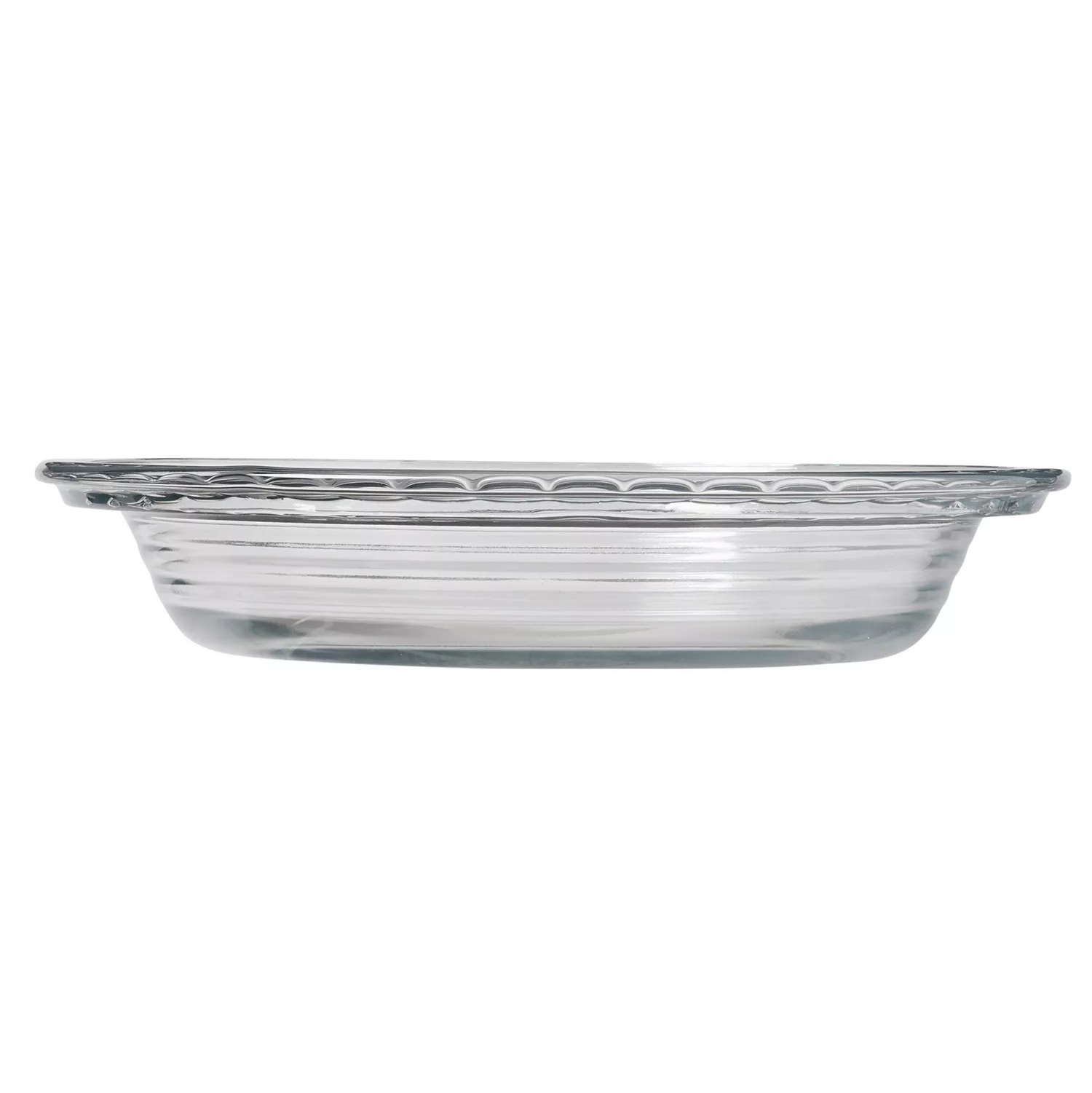 Clear glass pie dish with a decorated rim and horizontally ribbed sides.