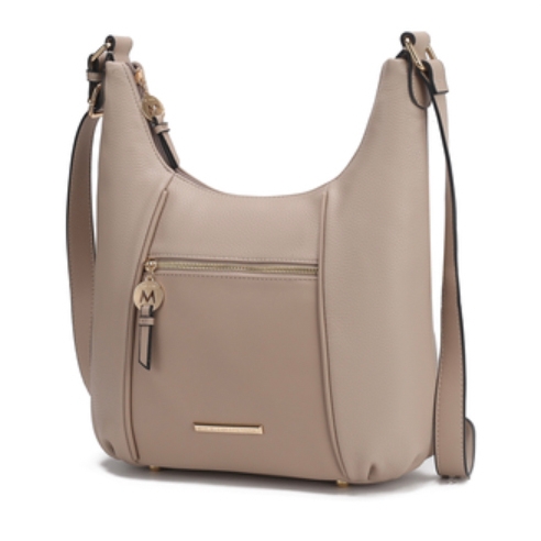Beige MKF shoulder bag with a curved shape, adjustable strap, front zip pocket with a charm, and small gold-tone emblem on the front.