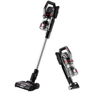Eureka Cordless Stick Vacuum, shown in full length and handheld mode, features a black and silver design with a clear dustbin and red accents. Its detachable hand vacuum highlights versatility for different cleaning needs.