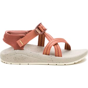 A Chaco sandal featuring an adjustable strap system, textured sole for grip, and a speckled footbed design with a reddish-orange color scheme.