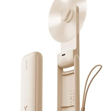 A beige foldable, portable fan with a USB charging port and a strap.