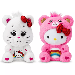 Two plush toys are shown: a white bear with a Hello Kitty emblem and a red bow, and a pink bear with a costume featuring Hello Kitty, a red bow, and a rainbow on the belly.