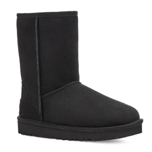 Black suede mid-calf boot with a flat rubber sole and visible stitching details.