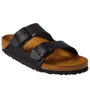 A black sandal with two adjustable straps and a cork footbed, designed for comfortable wear.