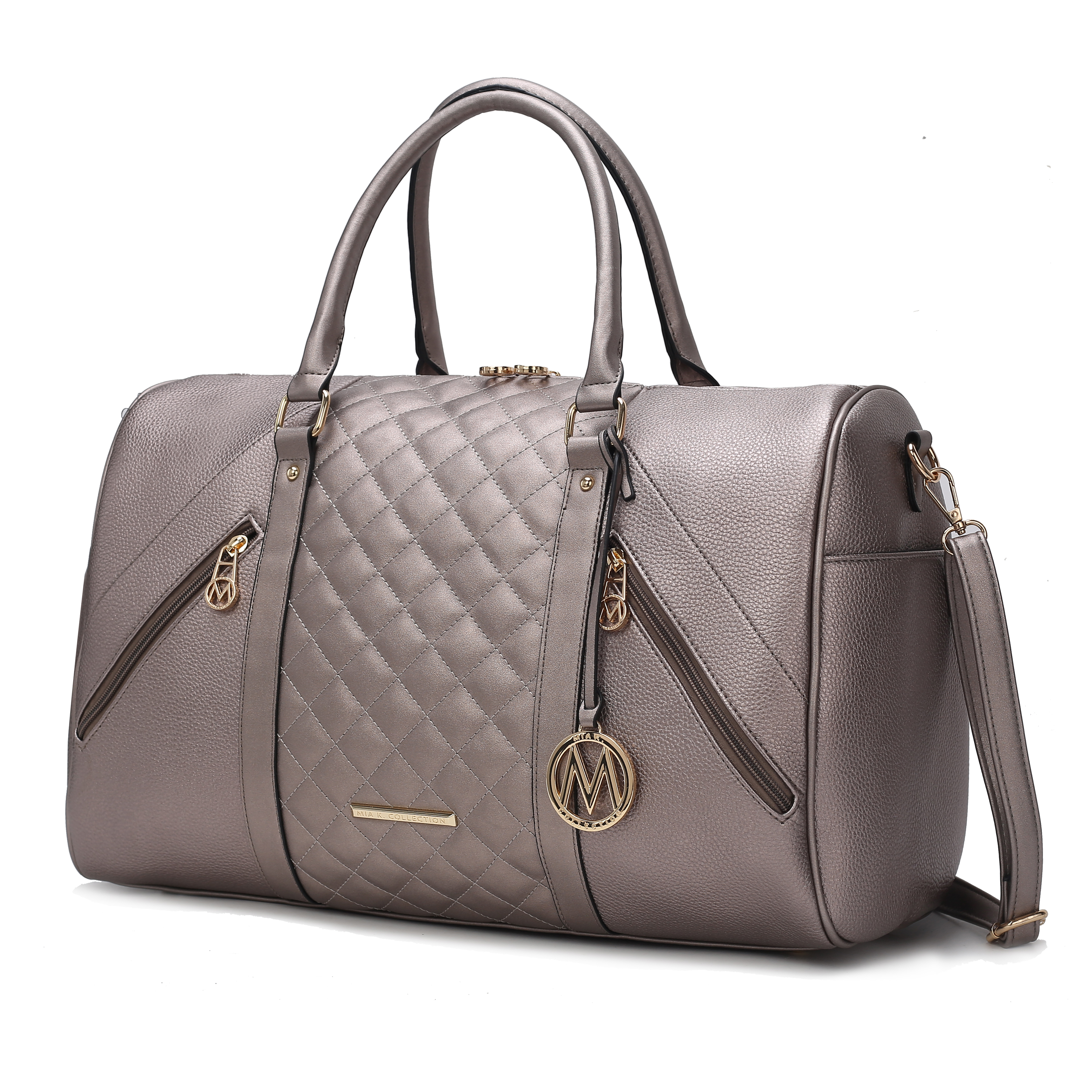 A gray, quilted duffel bag with gold accents, featuring dual handles, a detachable shoulder strap, and two vertical zippered pockets accented with a circular monogram charm.