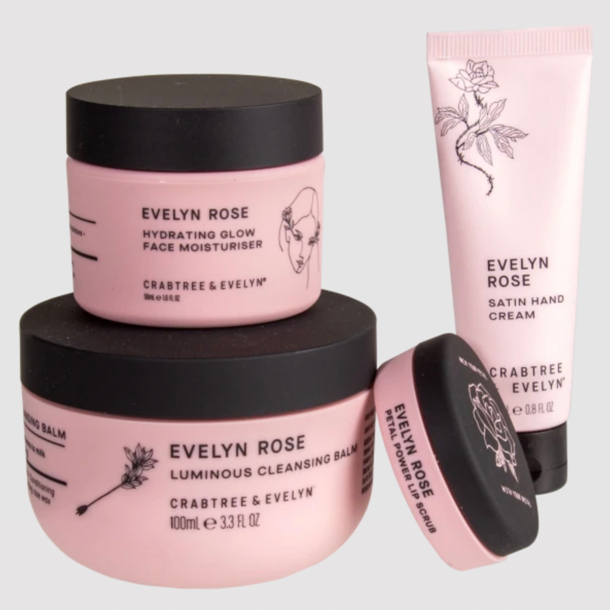 Three Evelyn Rose skincare items: Hydrating Glow Face Moisturiser, Satin Hand Cream, and Luminous Cleansing Balm, all in pink packaging.
