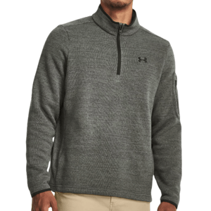 Gray Under Armour quarter-zip jacket with a textured pattern, featuring a small logo on the chest and a zippered pocket on the sleeve, designed for casual and athletic wear.