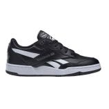 A black and white Reebok sneaker featuring a low-top design and distinctive stripes on the sides.