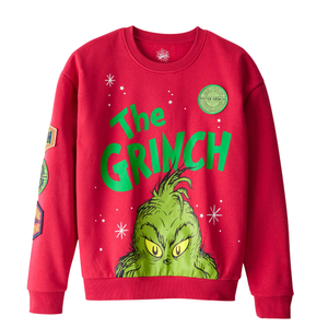 A red sweatshirt featuring \“The Grinch\“ text and illustration, with additional patches on the sleeves.