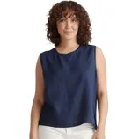 Sleeveless navy tank top made from 100% European linen, featuring a slightly relaxed fit with a crew neckline. The top is paired with white pants.