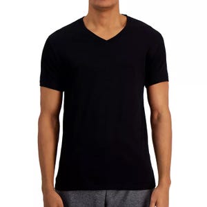 A black V-neck short sleeve T-shirt paired with gray pants, shown from the front.