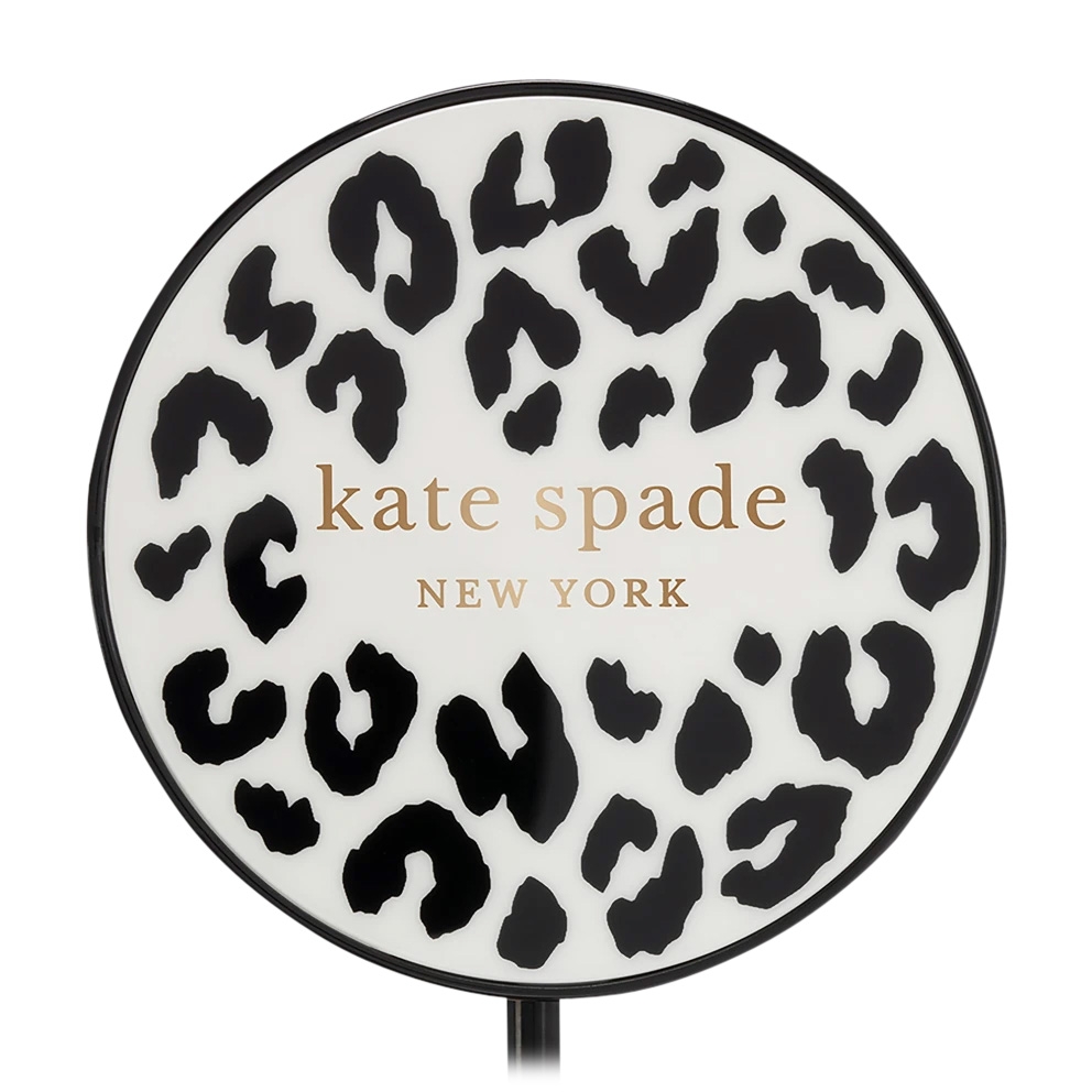 Kate Spade Wireless Charging Pad with a leopard print design features \“kate spade NEW YORK\“ branding in gold.