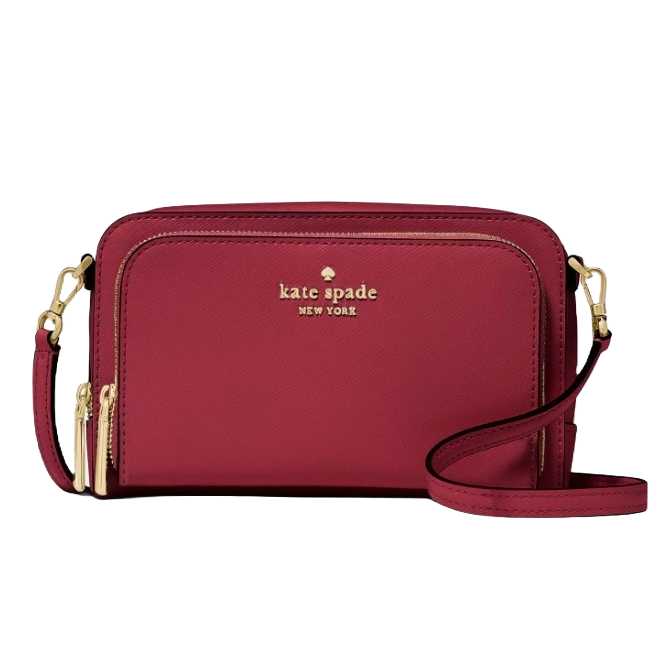 A red Kate Spade New York crossbody bag with gold zippers and an adjustable strap.