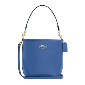 Blue Coach handbag with gold hardware, featuring a top handle and detachable shoulder strap.