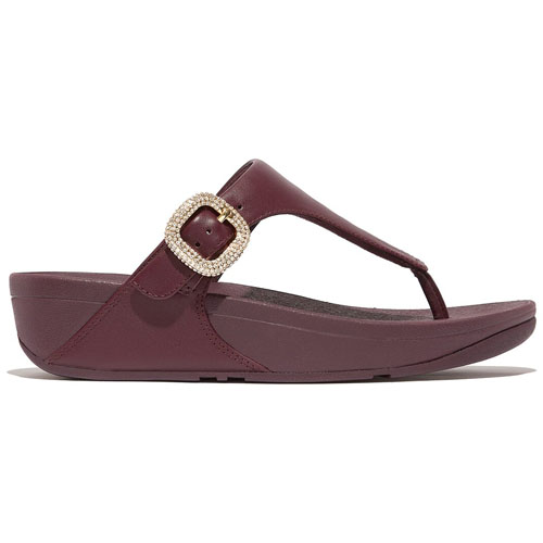 A maroon women's sandal with a platform sole and a decorative gold buckle on the strap.