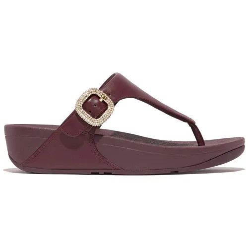 A maroon women's sandal with a platform sole and a decorative gold buckle on the strap.