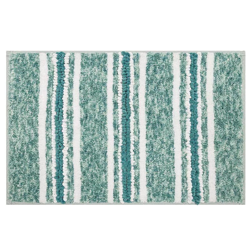A bath mat with a textured pattern featuring vertical stripes in shades of green, teal, and white.